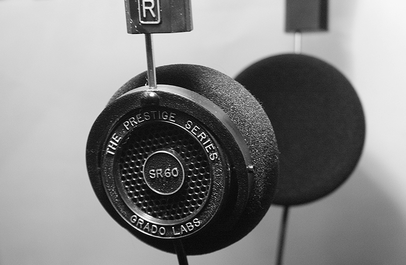 Black-and-white close-up of Grado SR60 headphones.